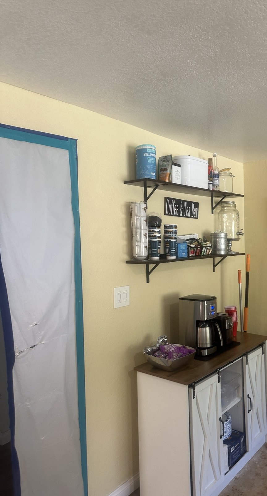 Plastic containment barrier sealing off a work area inside a home – 77 Rapid Restore